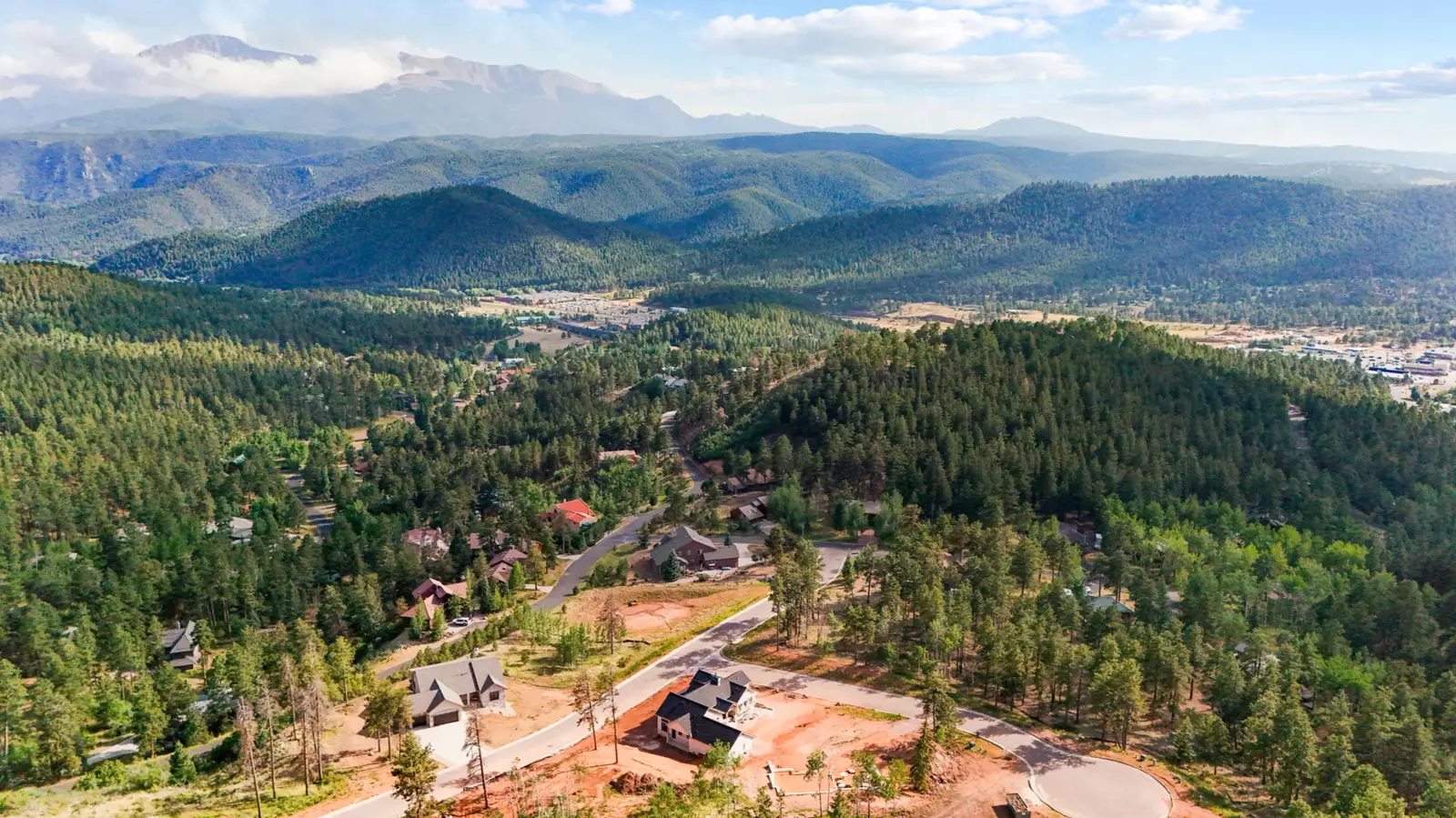 Aerial view of The Haven community in Woodland Park with Pikes Peak in the distance